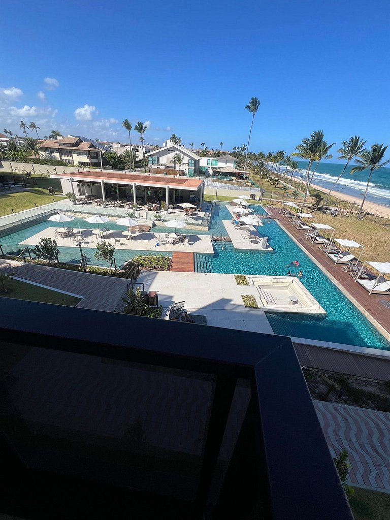 Cais Pé na Areia | 2 Quartos by Manta